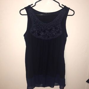 blue flowery blouse